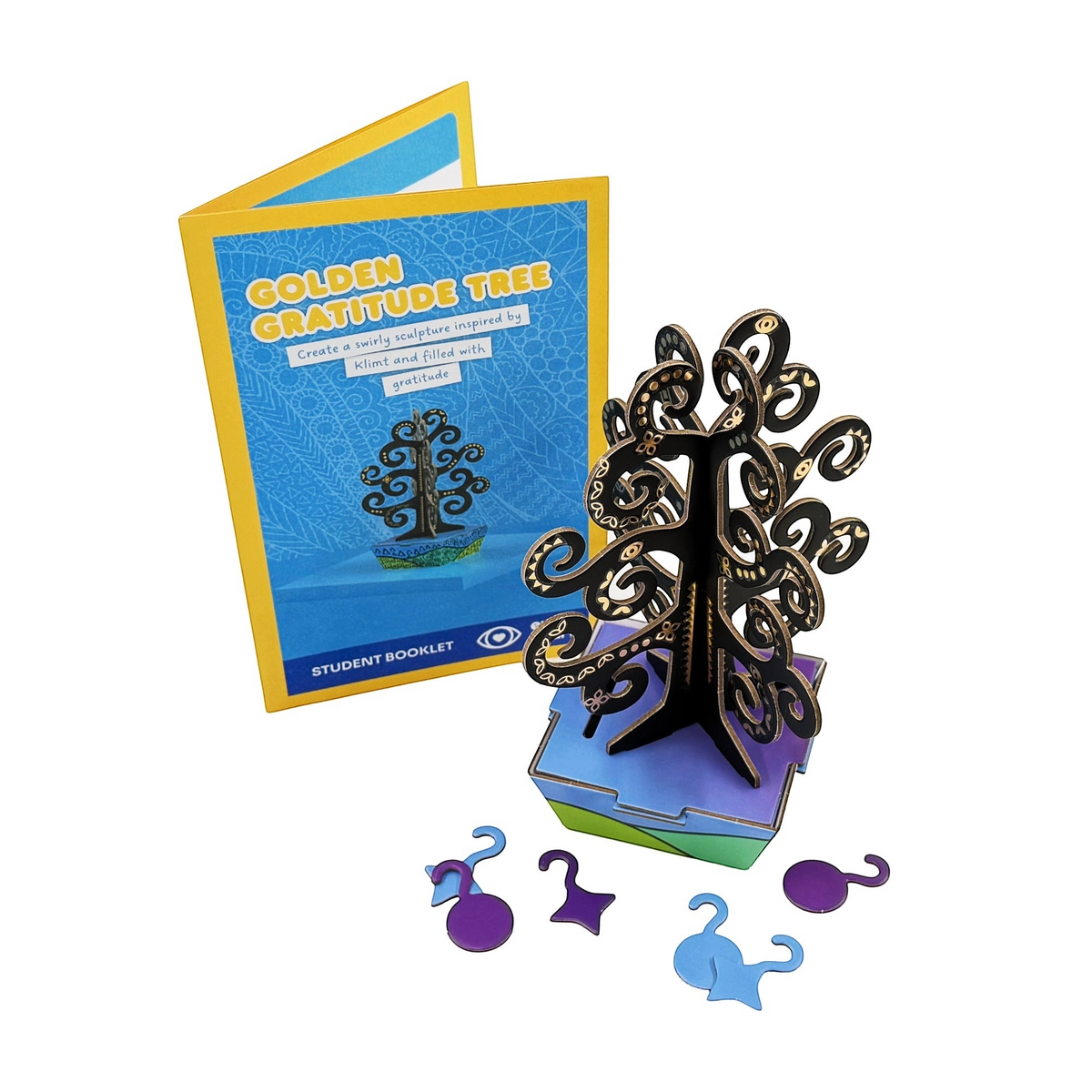 Golden Gratitude Tree instruction booklet shown with the finished tree sculpture and hanging ornaments
