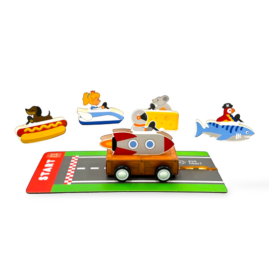 Eye Heart Soapbox Racers cardboard kit with a rocket car on a track and various themed drivers like a shark and mouse